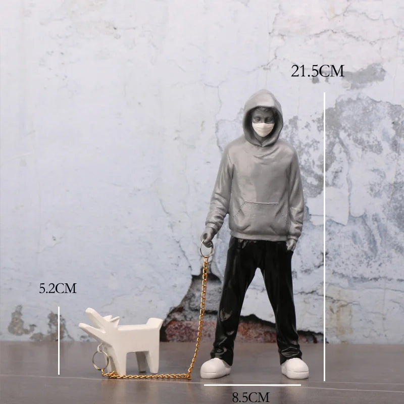 Hooded Man & Dog Figurine