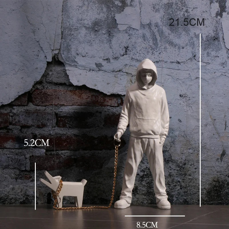 Hooded Man & Dog Figurine