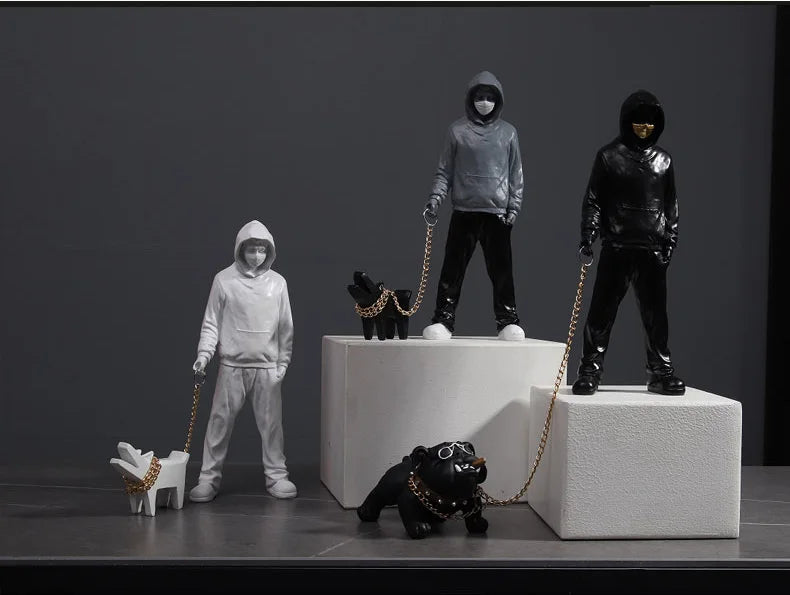 Hooded Man & Dog Figurine