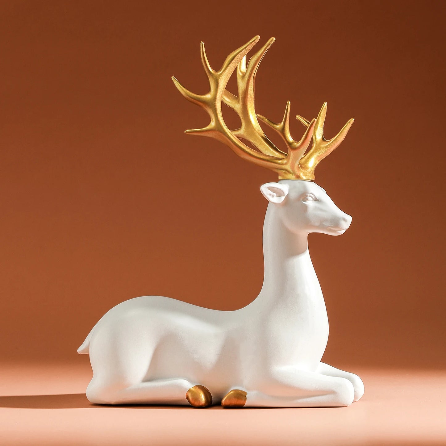 Majestic White and Gold Reindeer Figurines