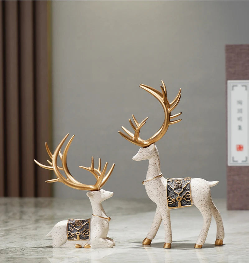Noble Blue and Gold Reindeer Figurines