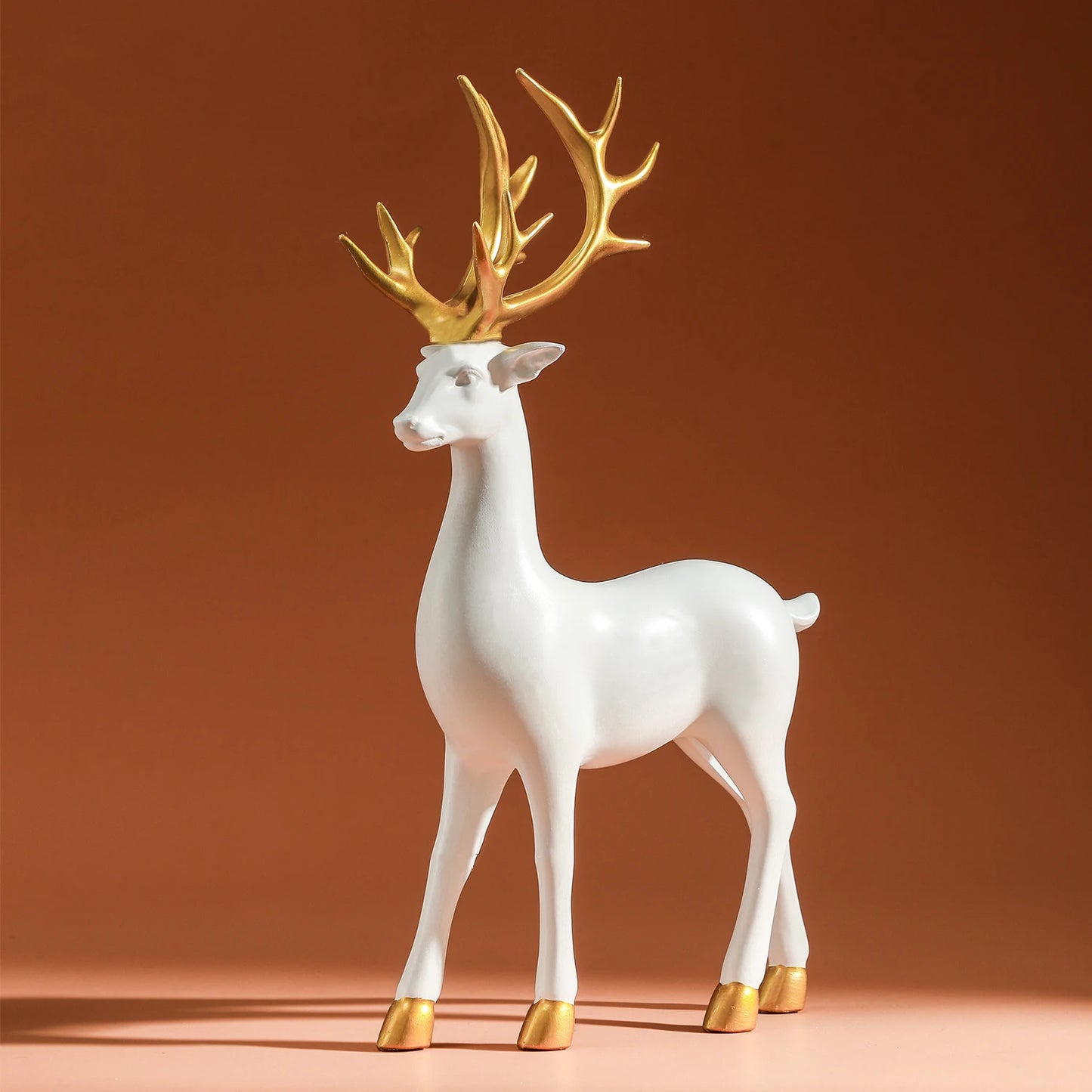 Majestic White and Gold Reindeer Figurines