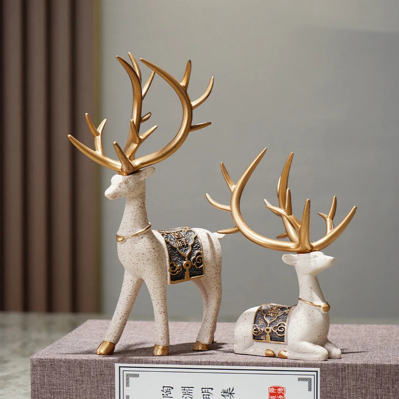 Noble Blue and Gold Reindeer Figurines
