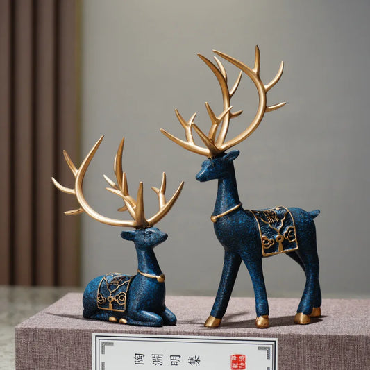 Noble Blue and Gold Reindeer Figurines