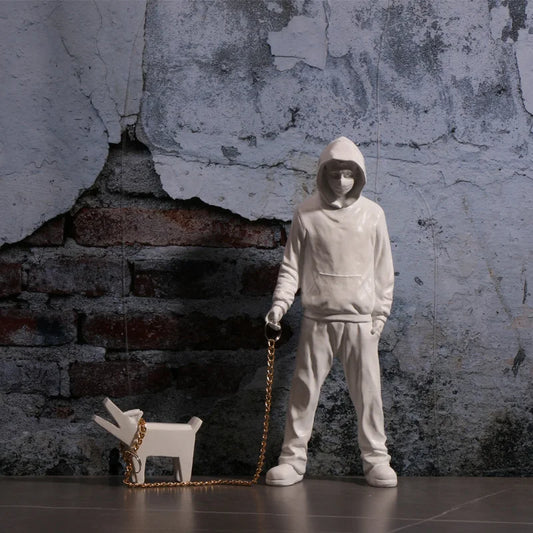 Hooded Man & Dog Figurine